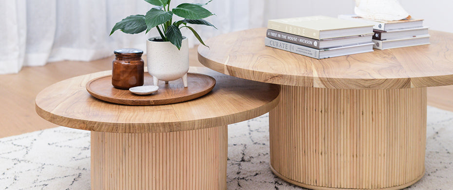 Two Teak and Rattan Round Coffee Tables Nested Together